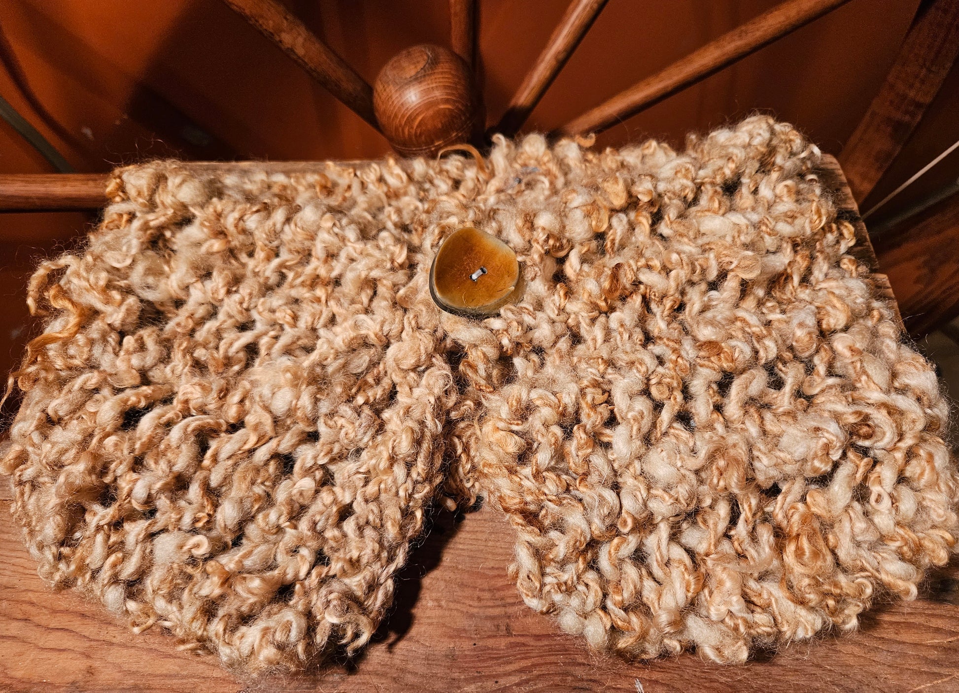 3LS Romney Wool handdyed with marigold flowers yellow gold color handspun yarn handknitted on farm adorned with 2" wood button