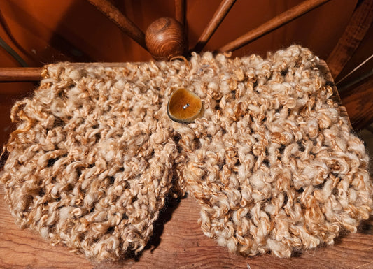 3LS Romney Wool handdyed with marigold flowers yellow gold color handspun yarn handknitted on farm adorned with 2" wood button